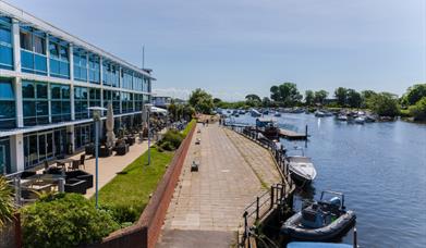 Exterior of the hotel by the river side.