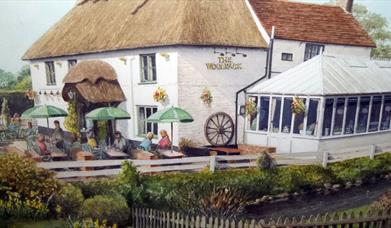 painting of people enjoying the Woolpack on a warm sunny day.