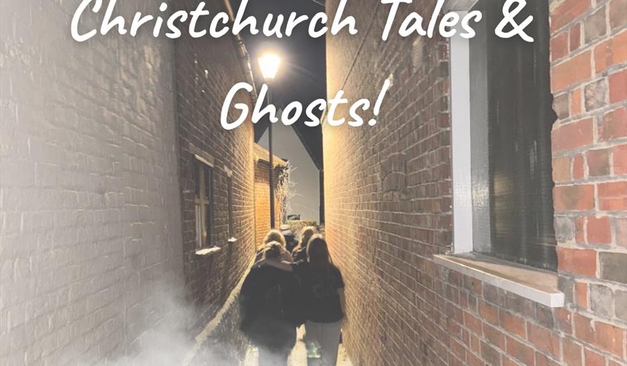 Promotional poster for Christchurch tales and ghosts, showing a group of people walking between some scary looking buildings at night