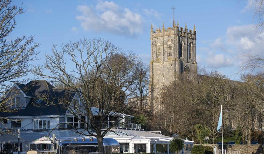 Restaurant exterior with priory in background