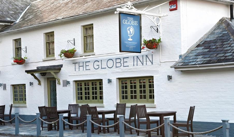 globe inn pub exterior painted white.