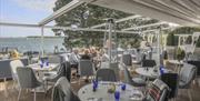 Christchurch Harbour Hotel - dining outside with views over the water