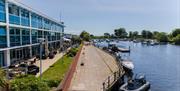 Exterior of the hotel by the river side.