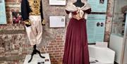 Exhibition of 19th century ladies and gentleman's costumes.