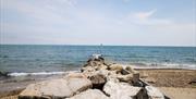 One of the groynes and Friars Cliff.