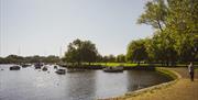 A rounded path beside the waters edge.