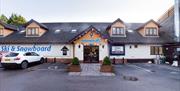 Exterior shot of the Snowtrax entrance and car park